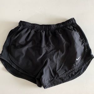 All black Nike running shorts